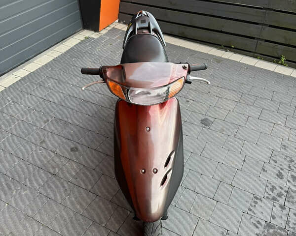 Красный Хонда Dio AF-34, объемом двигателя 0.05 л и пробегом 3 тыс. км за 420 $, фото 6 на Automoto.ua