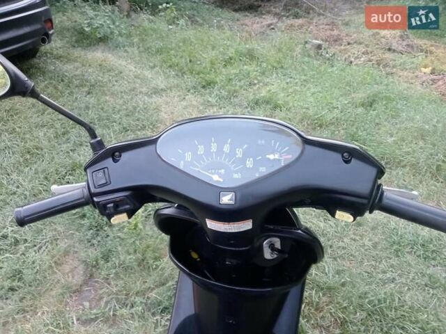 Черный Хонда Dio AF-62, объемом двигателя 0 л и пробегом 9 тыс. км за 603 $, фото 4 на Automoto.ua
