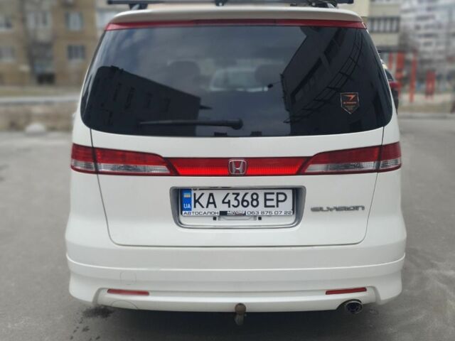 Белый Хонда Элизион, объемом двигателя 2.4 л и пробегом 135 тыс. км за 9500 $, фото 4 на Automoto.ua
