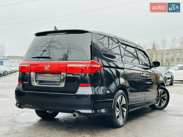 Черный Хонда Элизион, объемом двигателя 2.35 л и пробегом 84 тыс. км за 13400 $, фото 1 на Automoto.ua