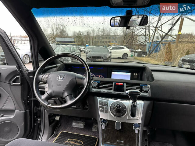 Черный Хонда Элизион, объемом двигателя 2.35 л и пробегом 84 тыс. км за 13400 $, фото 17 на Automoto.ua