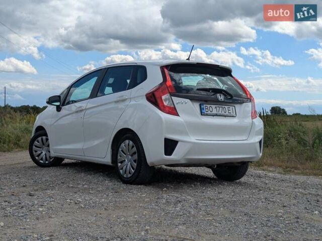 Білий Хонда ФІТ, об'ємом двигуна 1.5 л та пробігом 180 тис. км за 9700 $, фото 1 на Automoto.ua
