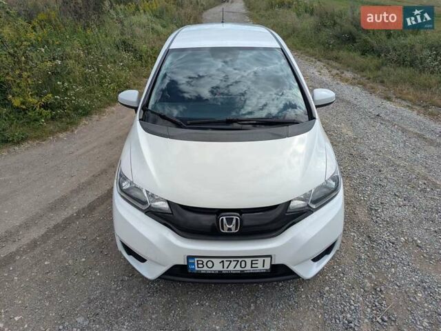 Білий Хонда ФІТ, об'ємом двигуна 1.5 л та пробігом 180 тис. км за 9700 $, фото 9 на Automoto.ua