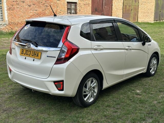 Білий Хонда ФІТ, об'ємом двигуна 1.5 л та пробігом 200 тис. км за 3999 $, фото 3 на Automoto.ua