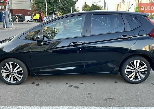Чорний Хонда ФІТ, об'ємом двигуна 1.5 л та пробігом 158 тис. км за 10900 $, фото 7 на Automoto.ua
