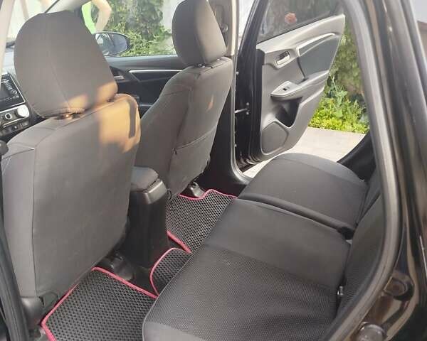 Черный Хонда ФИТ, объемом двигателя 1.5 л и пробегом 147 тыс. км за 10700 $, фото 5 на Automoto.ua