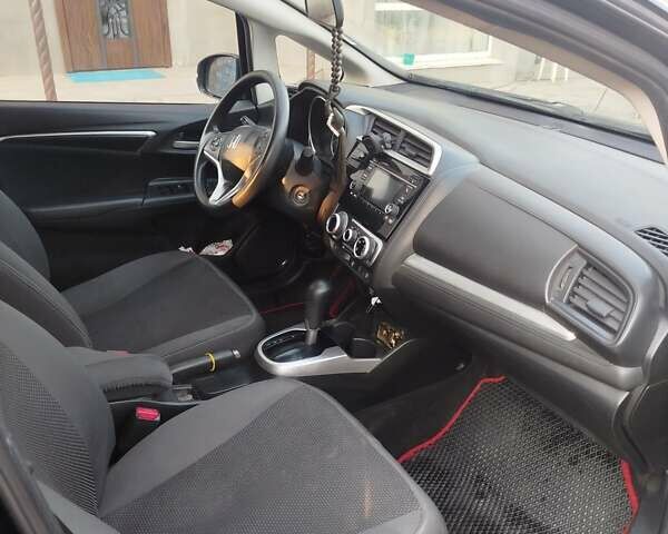 Черный Хонда ФИТ, объемом двигателя 1.5 л и пробегом 147 тыс. км за 10700 $, фото 6 на Automoto.ua