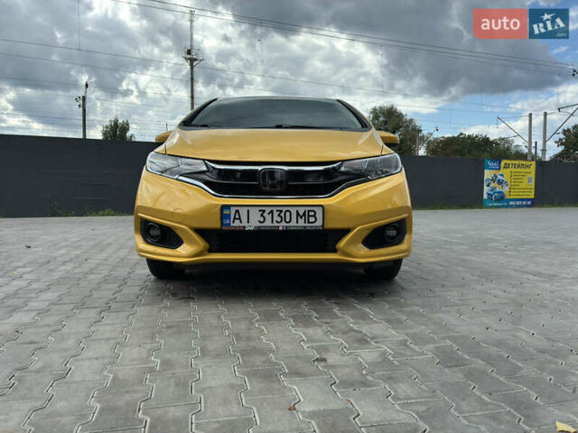 Желтый Хонда ФИТ, объемом двигателя 1.5 л и пробегом 135 тыс. км за 12500 $, фото 6 на Automoto.ua