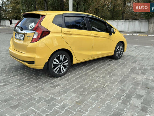 Желтый Хонда ФИТ, объемом двигателя 1.5 л и пробегом 137 тыс. км за 12000 $, фото 2 на Automoto.ua