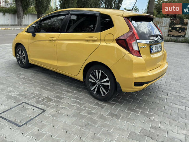 Желтый Хонда ФИТ, объемом двигателя 1.5 л и пробегом 137 тыс. км за 12000 $, фото 1 на Automoto.ua