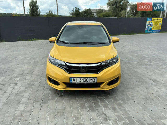 Желтый Хонда ФИТ, объемом двигателя 1.5 л и пробегом 135 тыс. км за 12500 $, фото 5 на Automoto.ua