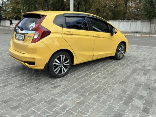 Желтый Хонда ФИТ, объемом двигателя 1.5 л и пробегом 136 тыс. км за 12000 $, фото 2 на Automoto.ua