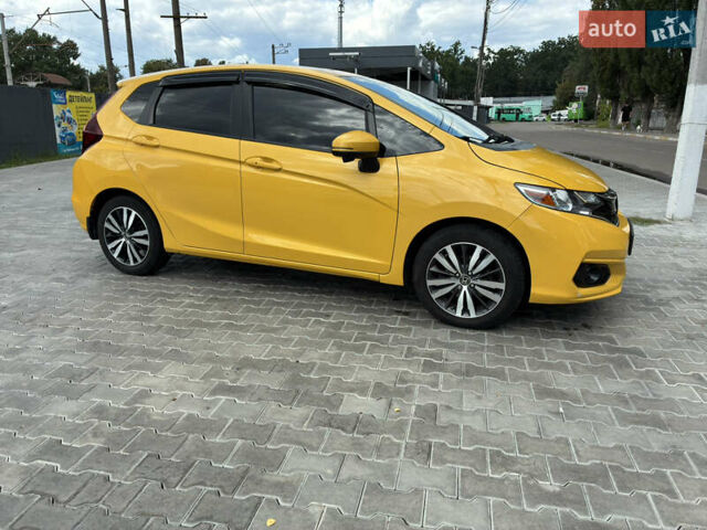 Жовтий Хонда ФІТ, об'ємом двигуна 1.5 л та пробігом 135 тис. км за 12500 $, фото 4 на Automoto.ua