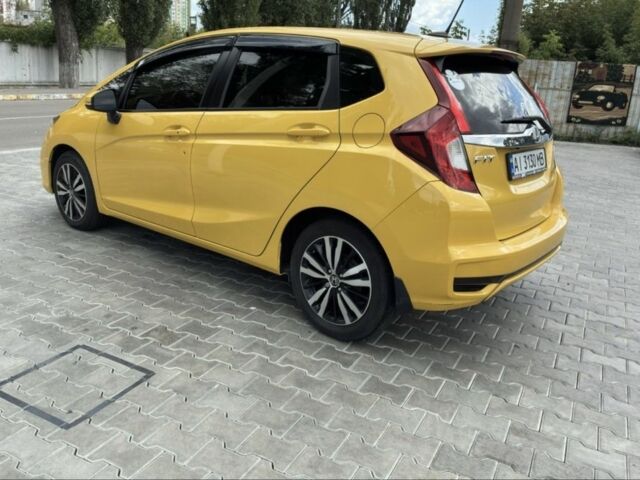 Желтый Хонда ФИТ, объемом двигателя 1.5 л и пробегом 136 тыс. км за 12000 $, фото 1 на Automoto.ua