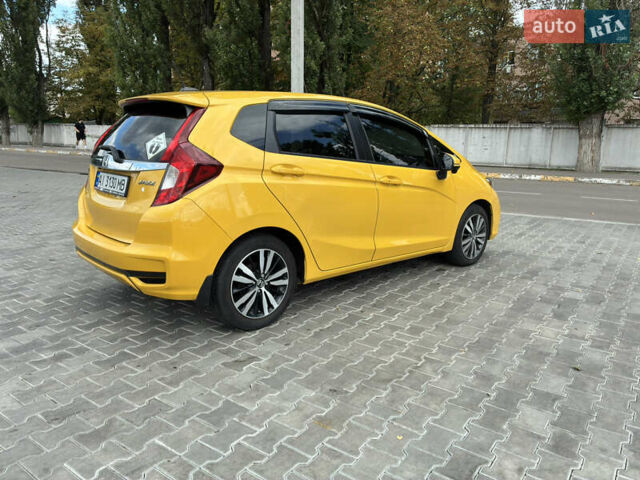 Желтый Хонда ФИТ, объемом двигателя 1.5 л и пробегом 135 тыс. км за 12500 $, фото 3 на Automoto.ua
