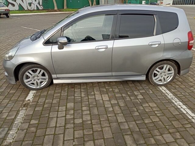 Серый Хонда ФИТ, объемом двигателя 1.3 л и пробегом 240 тыс. км за 5400 $, фото 6 на Automoto.ua