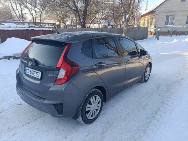 Серый Хонда ФИТ, объемом двигателя 1.5 л и пробегом 165 тыс. км за 8500 $, фото 2 на Automoto.ua