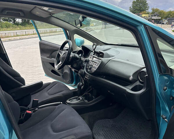 Синий Хонда ФИТ, объемом двигателя 1.5 л и пробегом 223 тыс. км за 7099 $, фото 9 на Automoto.ua