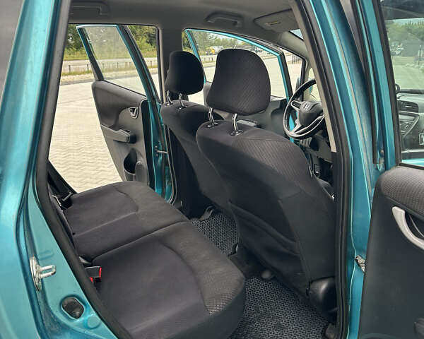 Синий Хонда ФИТ, объемом двигателя 1.5 л и пробегом 223 тыс. км за 7099 $, фото 13 на Automoto.ua