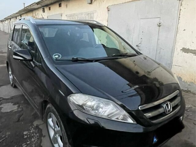 Черный Хонда ФРВ, объемом двигателя 1.8 л и пробегом 200 тыс. км за 6100 $, фото 2 на Automoto.ua