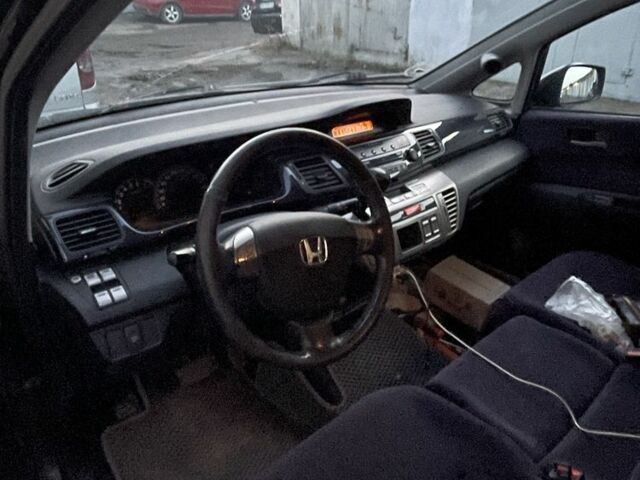 Черный Хонда ФРВ, объемом двигателя 1.8 л и пробегом 200 тыс. км за 6100 $, фото 4 на Automoto.ua