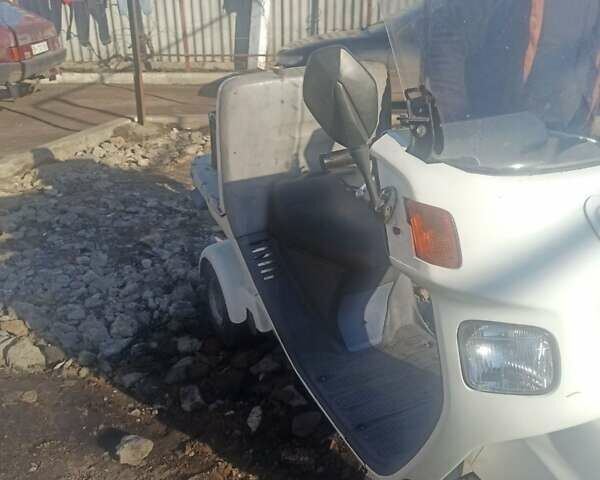 Белый Хонда Гуро, объемом двигателя 0.65 л и пробегом 200 тыс. км за 500 $, фото 1 на Automoto.ua