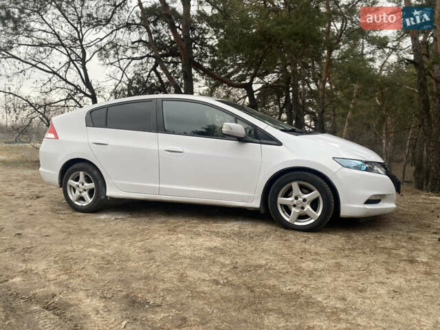 Білий Хонда Інсайт, об'ємом двигуна 1.34 л та пробігом 233 тис. км за 9600 $, фото 7 на Automoto.ua