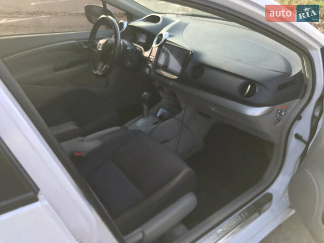 Белый Хонда Инсайт, объемом двигателя 1.3 л и пробегом 220 тыс. км за 6000 $, фото 1 на Automoto.ua