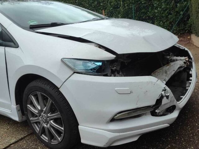 Белый Хонда Инсайт, объемом двигателя 1.3 л и пробегом 3 тыс. км за 1845 $, фото 5 на Automoto.ua