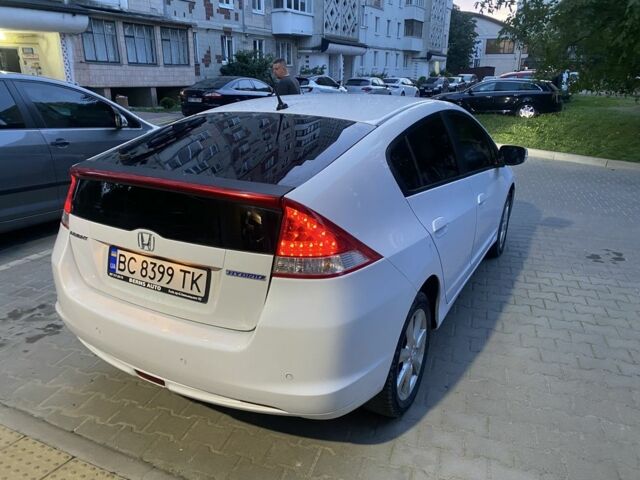 Білий Хонда Інсайт, об'ємом двигуна 1.3 л та пробігом 250 тис. км за 6863 $, фото 3 на Automoto.ua
