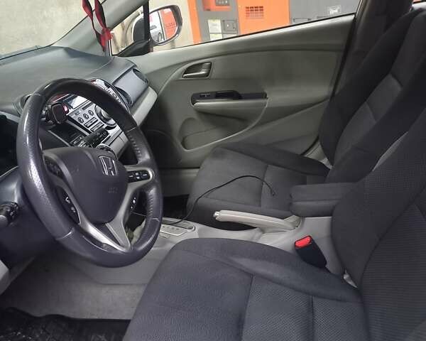 Белый Хонда Инсайт, объемом двигателя 1.3 л и пробегом 330 тыс. км за 4999 $, фото 6 на Automoto.ua