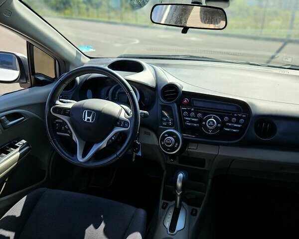 Білий Хонда Інсайт, об'ємом двигуна 1.3 л та пробігом 255 тис. км за 7500 $, фото 26 на Automoto.ua