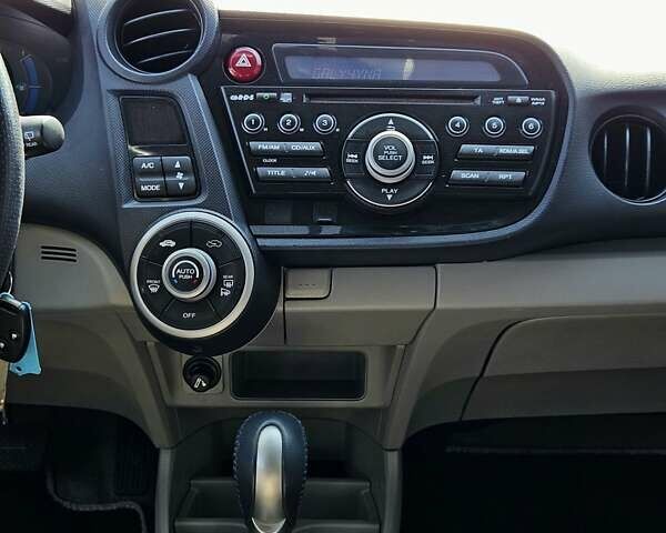 Білий Хонда Інсайт, об'ємом двигуна 1.3 л та пробігом 255 тис. км за 7500 $, фото 23 на Automoto.ua