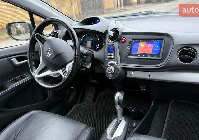 Білий Хонда Інсайт, об'ємом двигуна 1.34 л та пробігом 175 тис. км за 8000 $, фото 8 на Automoto.ua