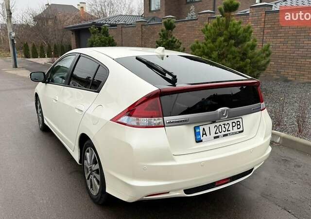 Білий Хонда Інсайт, об'ємом двигуна 1.34 л та пробігом 175 тис. км за 8000 $, фото 4 на Automoto.ua