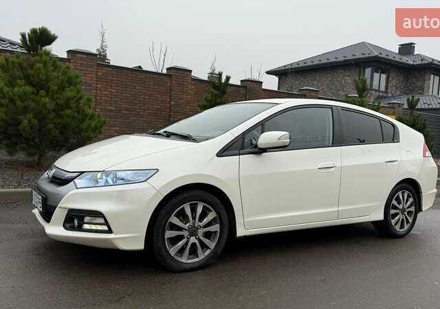 Білий Хонда Інсайт, об'ємом двигуна 1.34 л та пробігом 175 тис. км за 8000 $, фото 6 на Automoto.ua