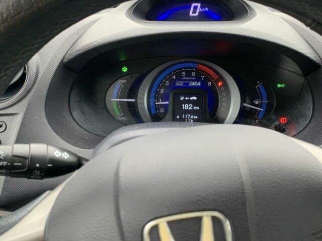 Білий Хонда Інсайт, об'ємом двигуна 1.3 л та пробігом 297 тис. км за 6600 $, фото 6 на Automoto.ua