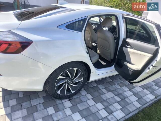 Білий Хонда Інсайт, об'ємом двигуна 1.5 л та пробігом 66 тис. км за 19900 $, фото 9 на Automoto.ua