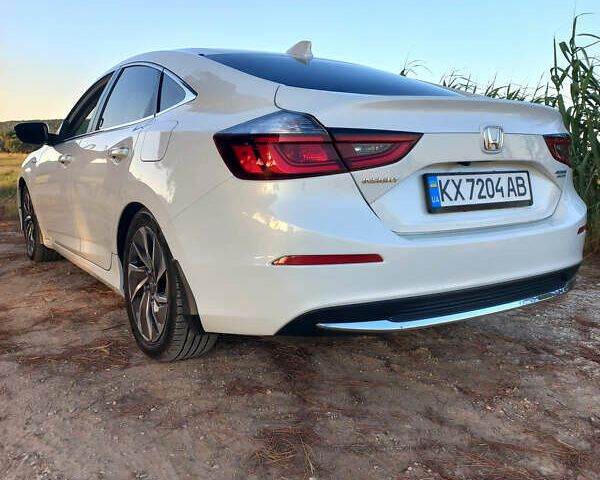 Білий Хонда Інсайт, об'ємом двигуна 1.5 л та пробігом 72 тис. км за 23000 $, фото 4 на Automoto.ua