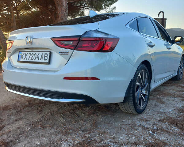 Білий Хонда Інсайт, об'ємом двигуна 1.5 л та пробігом 72 тис. км за 23000 $, фото 3 на Automoto.ua