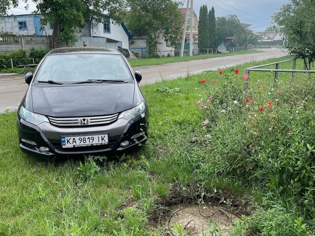 Черный Хонда Инсайт, объемом двигателя 1.34 л и пробегом 196 тыс. км за 5800 $, фото 7 на Automoto.ua