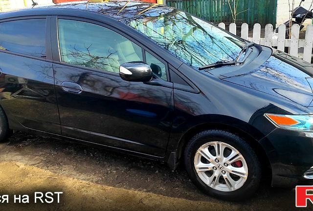 Черный Хонда Инсайт, объемом двигателя 1.3 л и пробегом 242 тыс. км за 7500 $, фото 1 на Automoto.ua