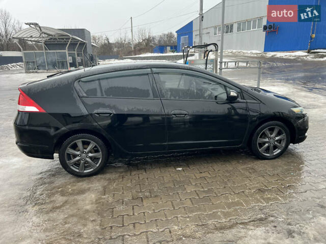 Черный Хонда Инсайт, объемом двигателя 1.34 л и пробегом 213 тыс. км за 6700 $, фото 5 на Automoto.ua