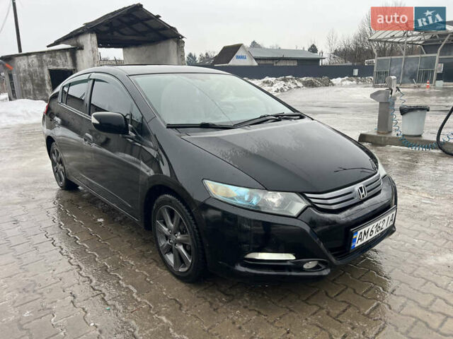 Черный Хонда Инсайт, объемом двигателя 1.34 л и пробегом 213 тыс. км за 6700 $, фото 6 на Automoto.ua