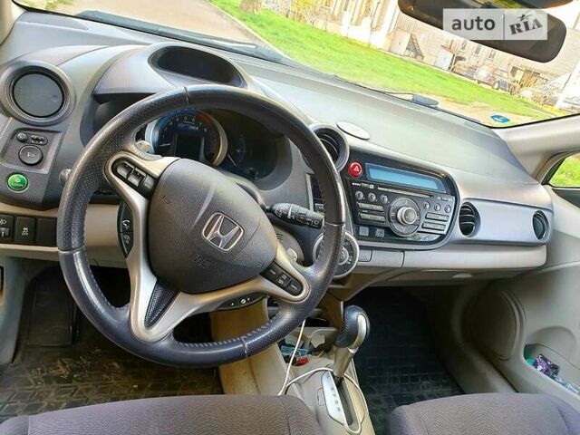 Черный Хонда Инсайт, объемом двигателя 1.3 л и пробегом 299 тыс. км за 6999 $, фото 5 на Automoto.ua
