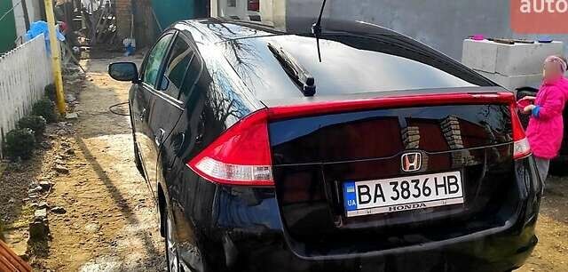 Чорний Хонда Інсайт, об'ємом двигуна 1.3 л та пробігом 242 тис. км за 7500 $, фото 1 на Automoto.ua