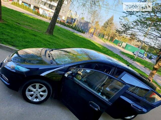 Черный Хонда Инсайт, объемом двигателя 1.3 л и пробегом 299 тыс. км за 6999 $, фото 3 на Automoto.ua