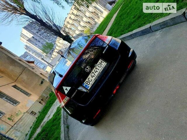 Черный Хонда Инсайт, объемом двигателя 1.3 л и пробегом 299 тыс. км за 6999 $, фото 2 на Automoto.ua