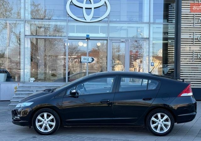 Чорний Хонда Інсайт, об'ємом двигуна 1.3 л та пробігом 170 тис. км за 5999 $, фото 1 на Automoto.ua