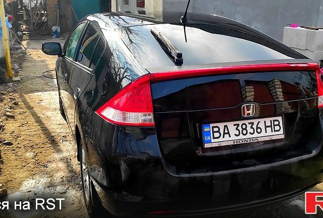 Черный Хонда Инсайт, объемом двигателя 1.3 л и пробегом 242 тыс. км за 7500 $, фото 3 на Automoto.ua